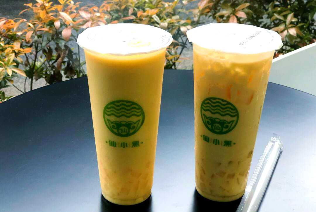 全自动杨枝甘露灌装封口生产线:高效、精准、环保的一体化包装解决方案