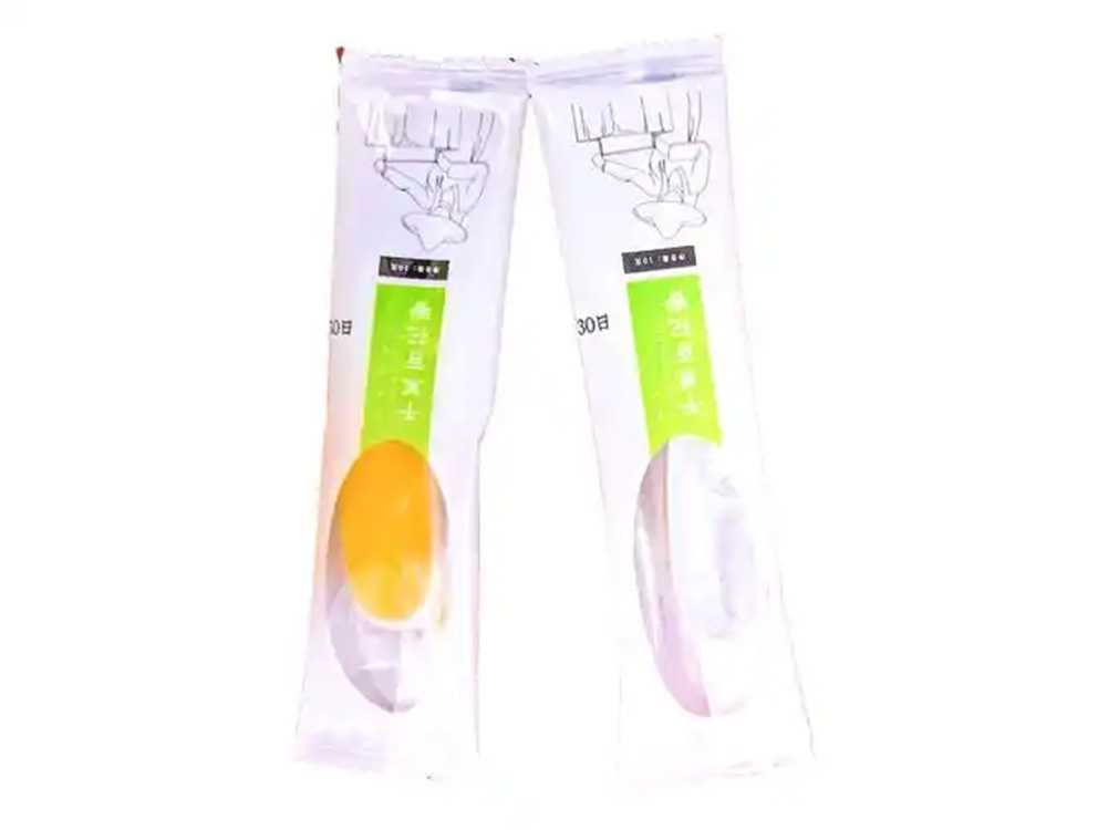 吕工机械全自动勺子灌装封口机——解决蜂蜜、膏方、秋梨膏等高黏物料包装难题